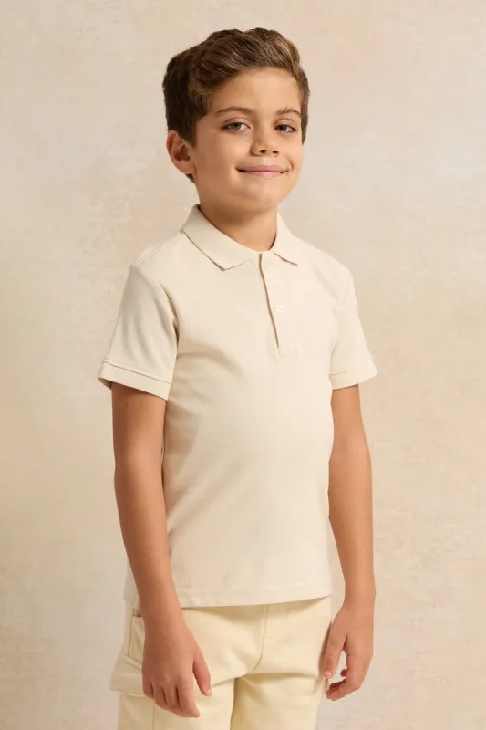 Boys Beige Basic Polo Shirt sold by Redtag