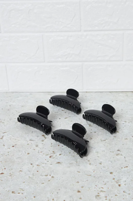 Women Black Hair Claw Set (4 Piece) sold by Redtag