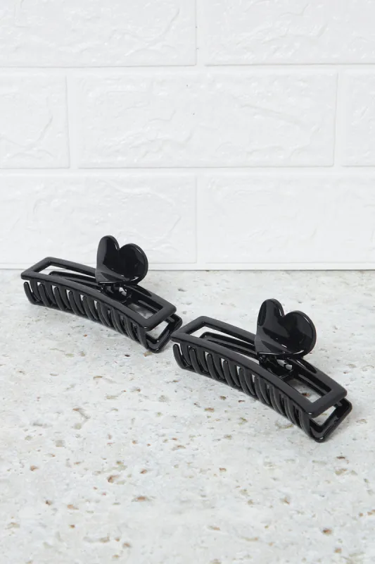 Women Black Solid Hair Claw (2 Piece) sold by Redtag