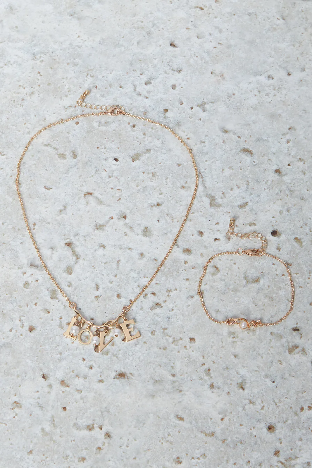 Women Gold Necklace And Bracelet Set (2 Piece) sold by Redtag