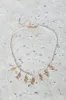 Women White And Gold Pearl Embellished Necklace sold by Redtag