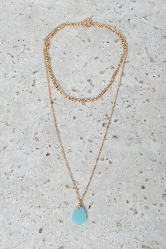 Women Gold And Blue Pendant Necklace sold by Redtag
