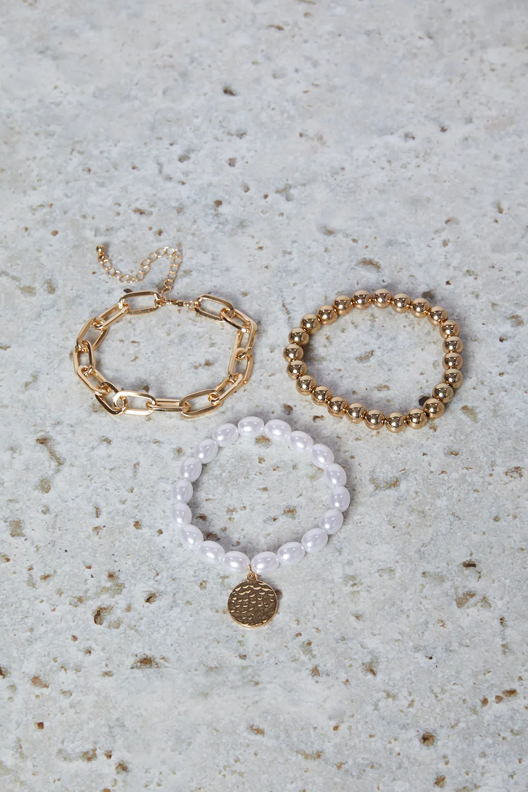 Women Gold Pearls Bracelet Set (Pack of 3) sold by Redtag