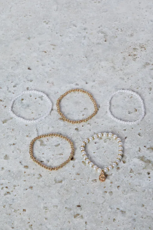 Women Gold Pearls Bracelet Set (Pack of 5) sold by Redtag