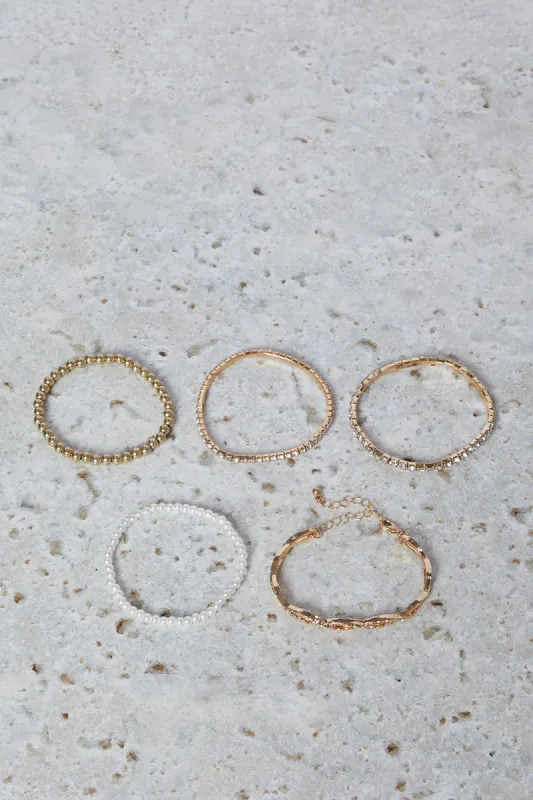 Women Gold Pearls Bracelet Set (Pack of 5) sold by Redtag