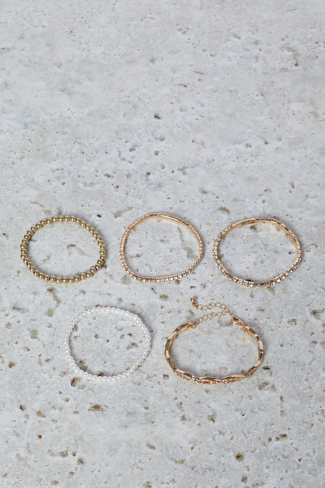 Women Gold Pearls Bracelet Set (Pack of 5) sold by Redtag