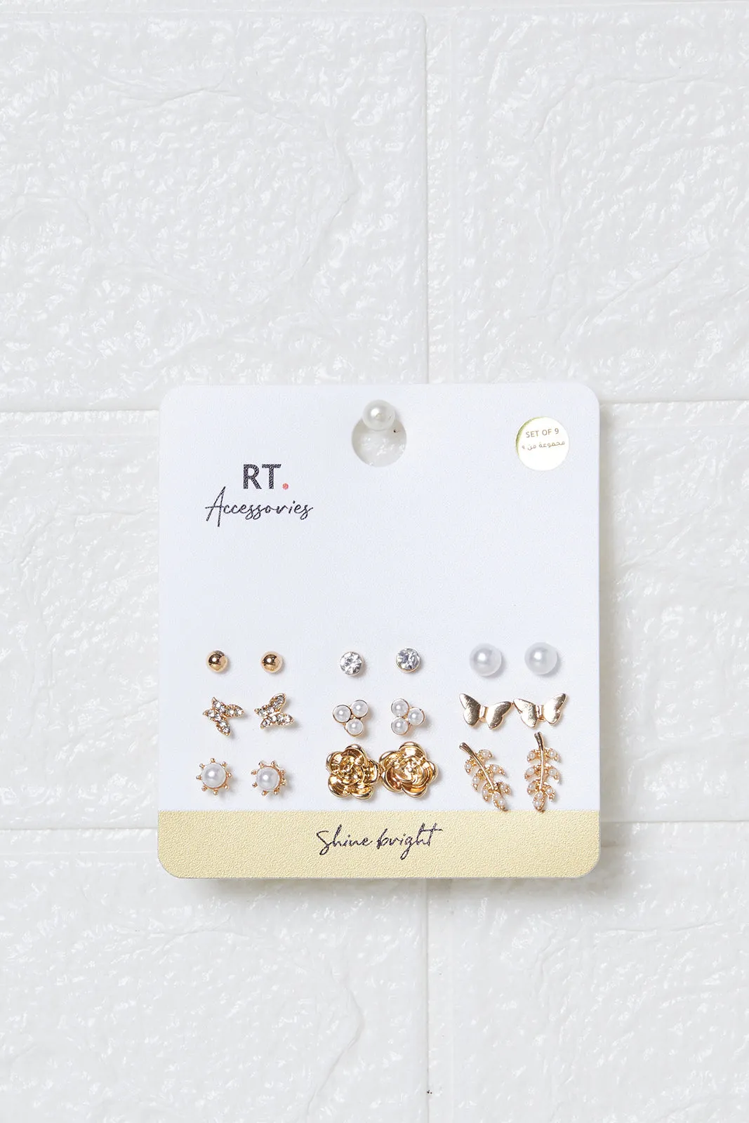 Women Gold Embellished Studs (9 Pairs) sold by Redtag