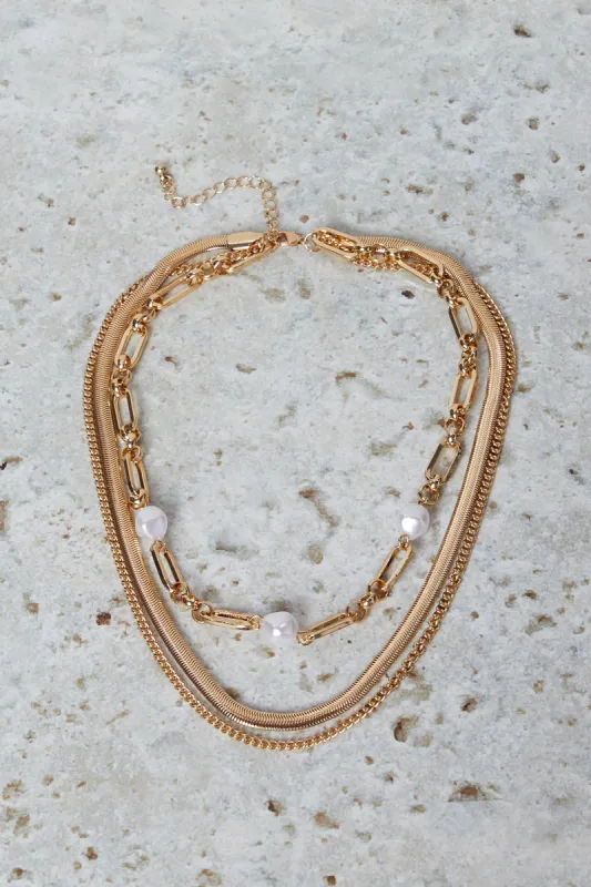 Women Gold Pearls Necklace sold by Redtag