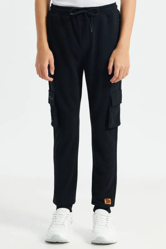 Senior Boys Black Reflective Print Cargo Active Pants sold by Redtag