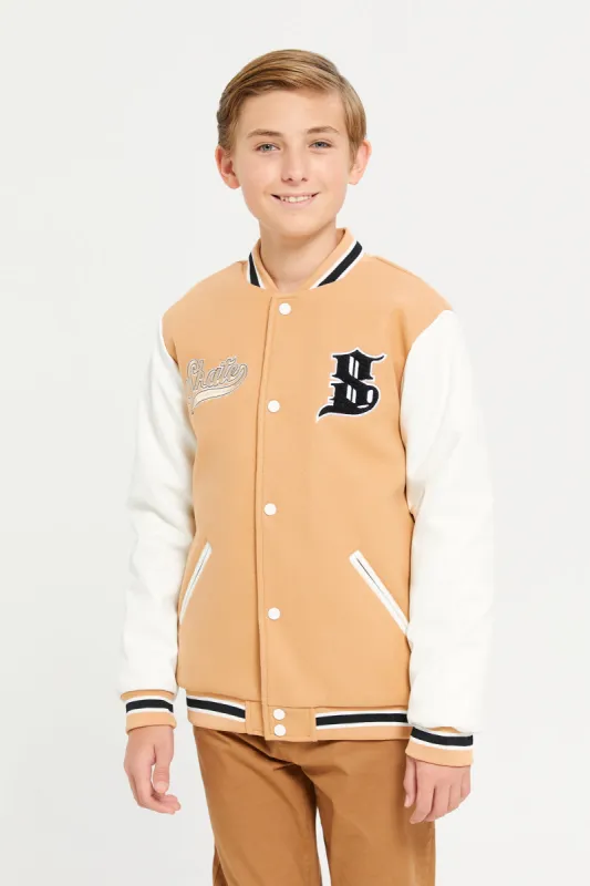 Senior Boys Beige Embellished Basketball Jacket sold by Redtag