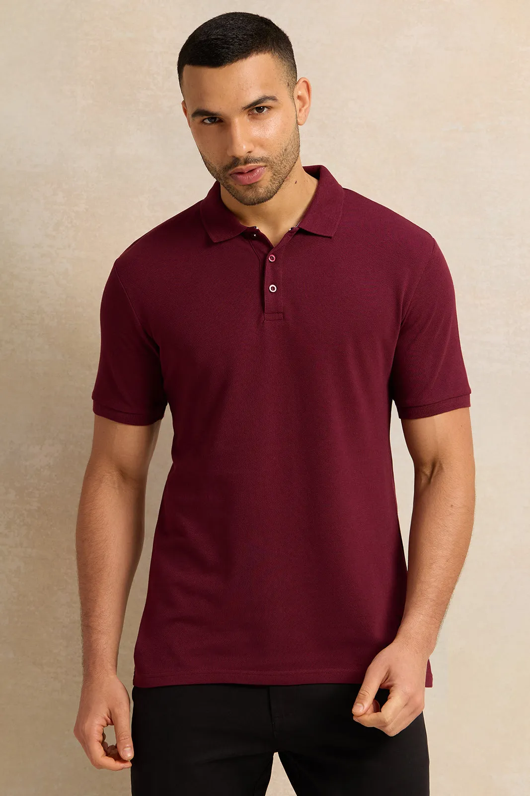 Men Burgundy Solid Pique Polo Shirt sold by Redtag