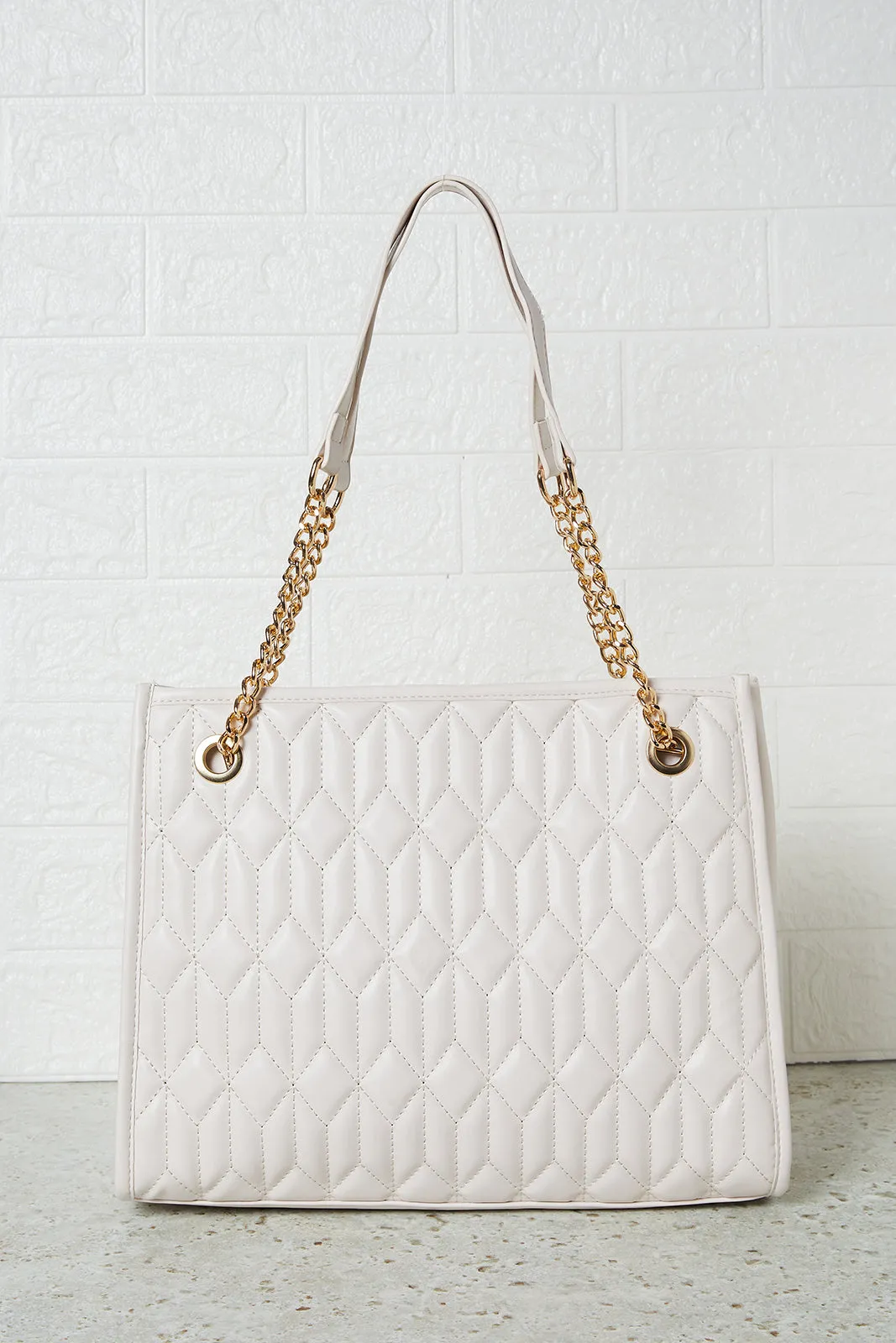 Women Beige Quilted Tote Bag sold by Redtag