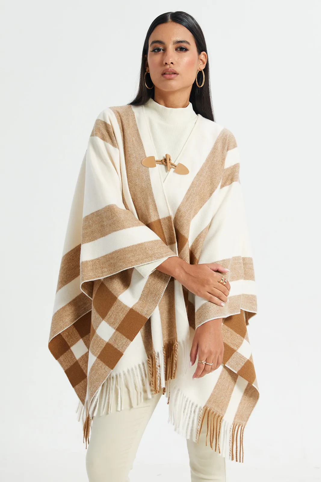 Women Beige And White Checked Poncho sold by Redtag