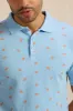 Men Blue All Over Print Polo Shirt sold by Redtag