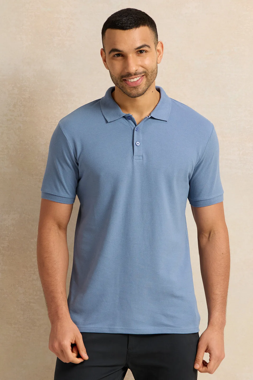 Men Blue Solid Pique Polo Shirt sold by Redtag