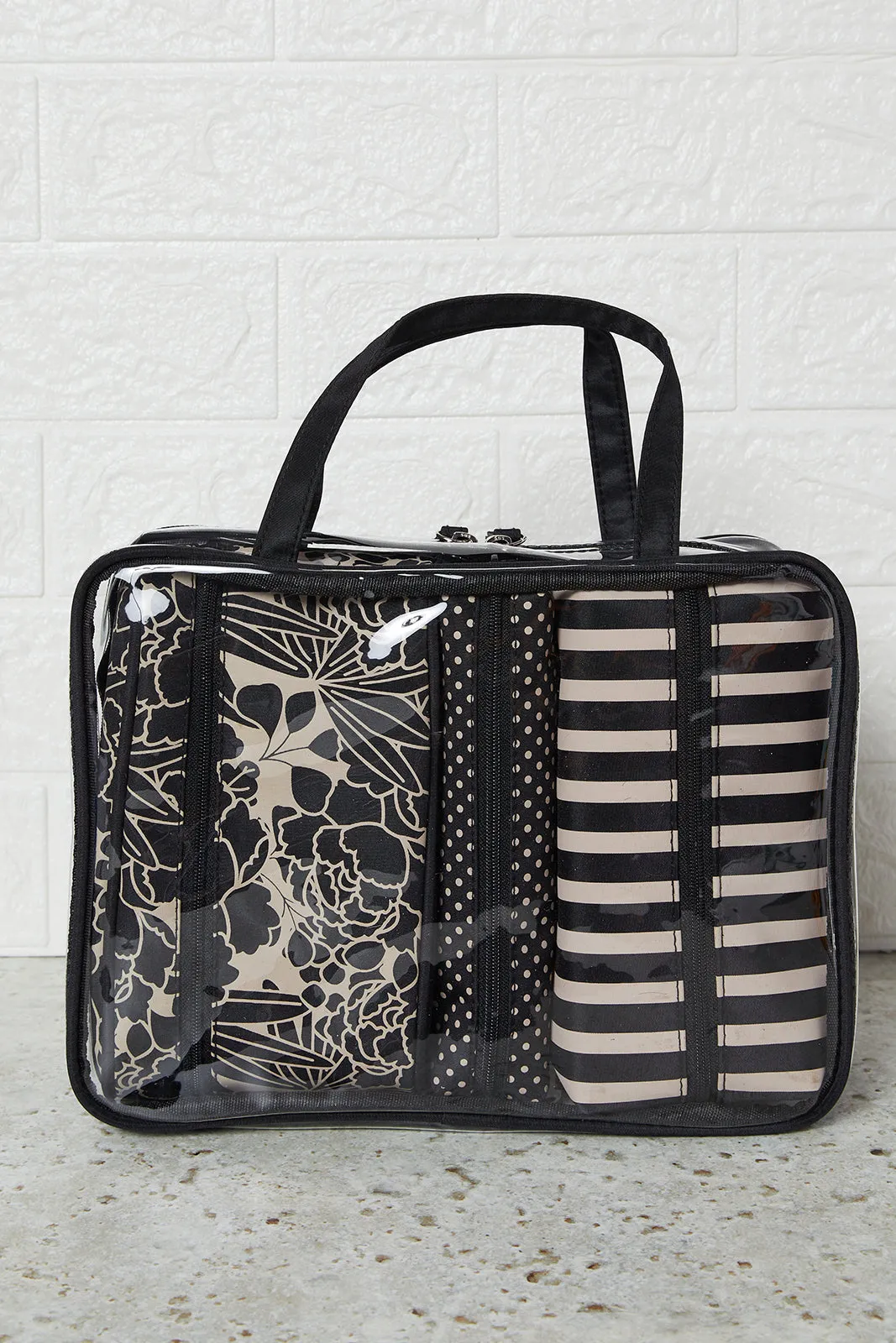 Women Black And Brown Printed Cosmetic Pouch (4 Piece) sold by Redtag