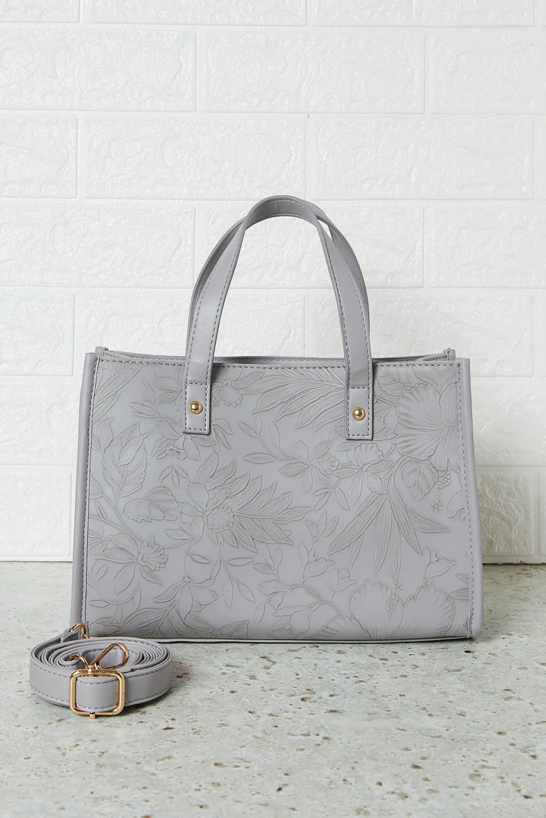 Women Grey Embossed Messenger Bag sold by Redtag