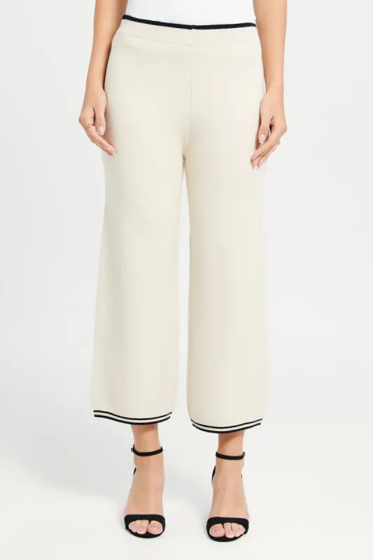 Women Beige Solid Wide Leg Pants sold by Redtag
