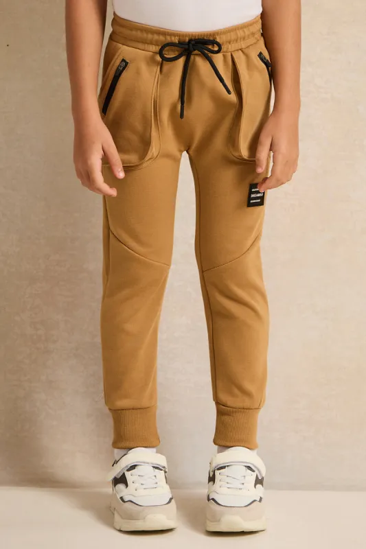 Boys Beige Zip Pocket Track Pants sold by Redtag