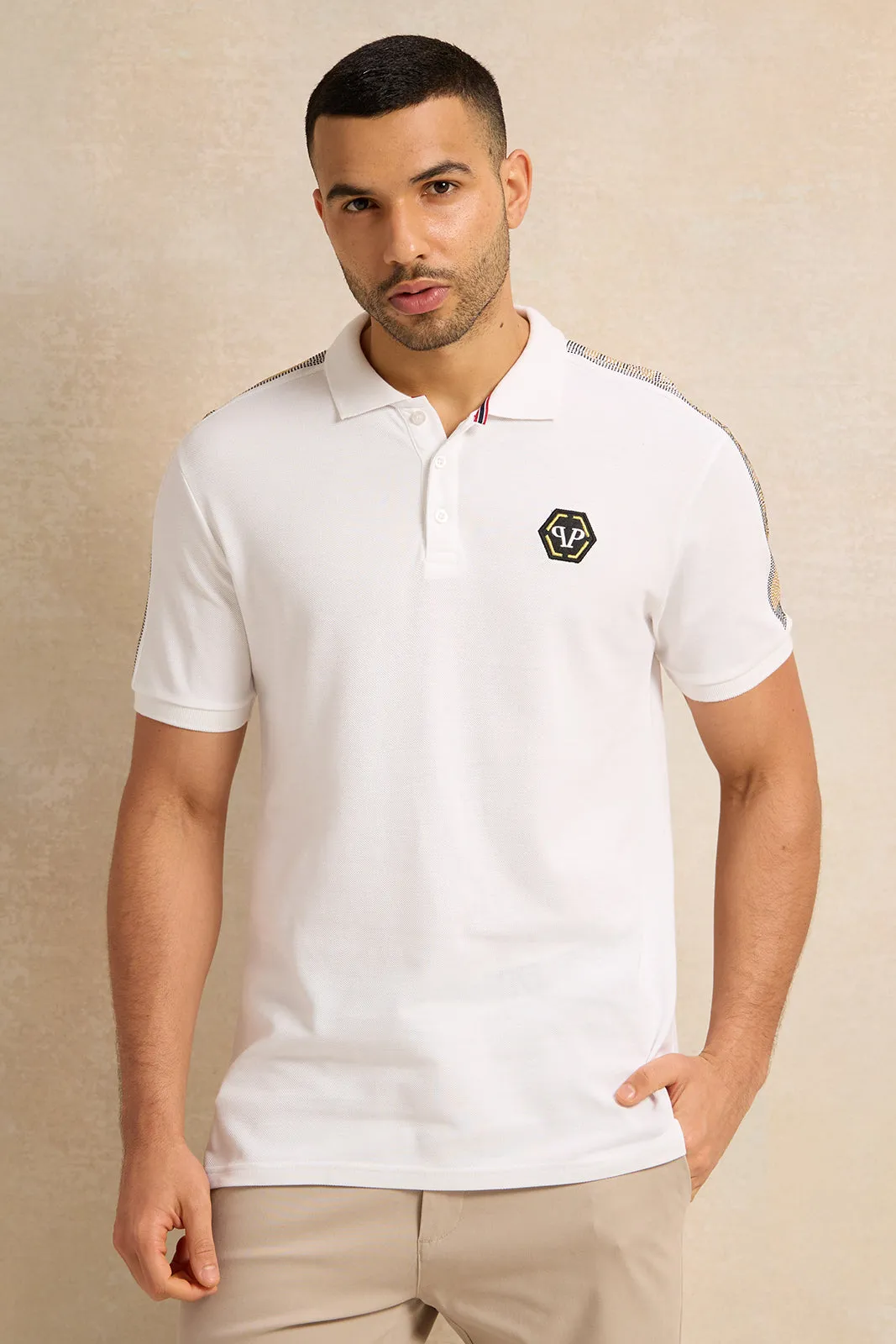 Men White Solid Polo Shirt sold by Redtag