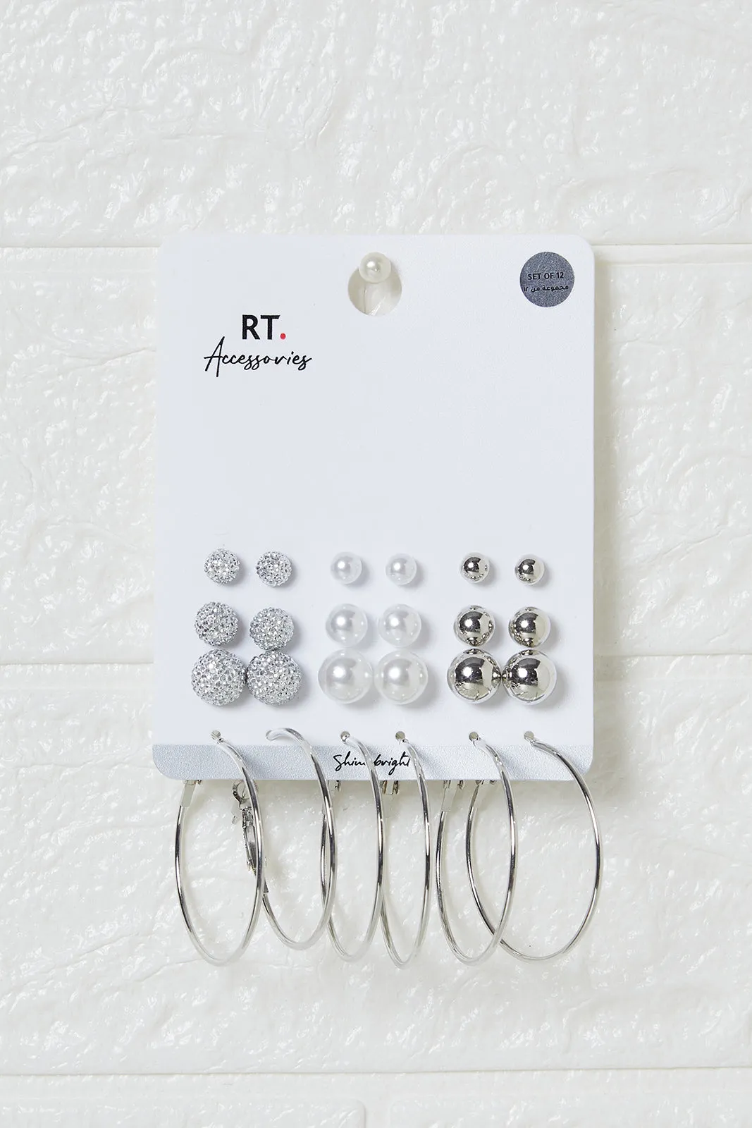 Women Silver Embellished Earrings Set (12 Pairs) sold by Redtag