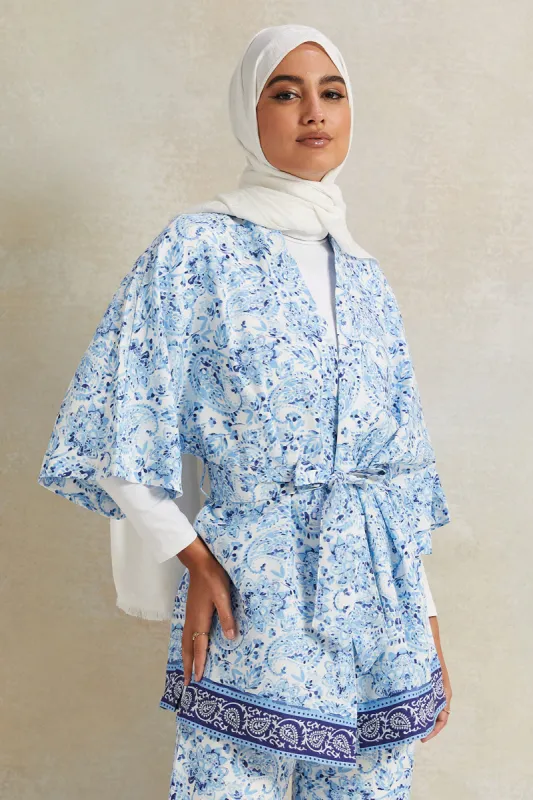 Women Blue Printed Open Front Belted Blouse sold by Redtag