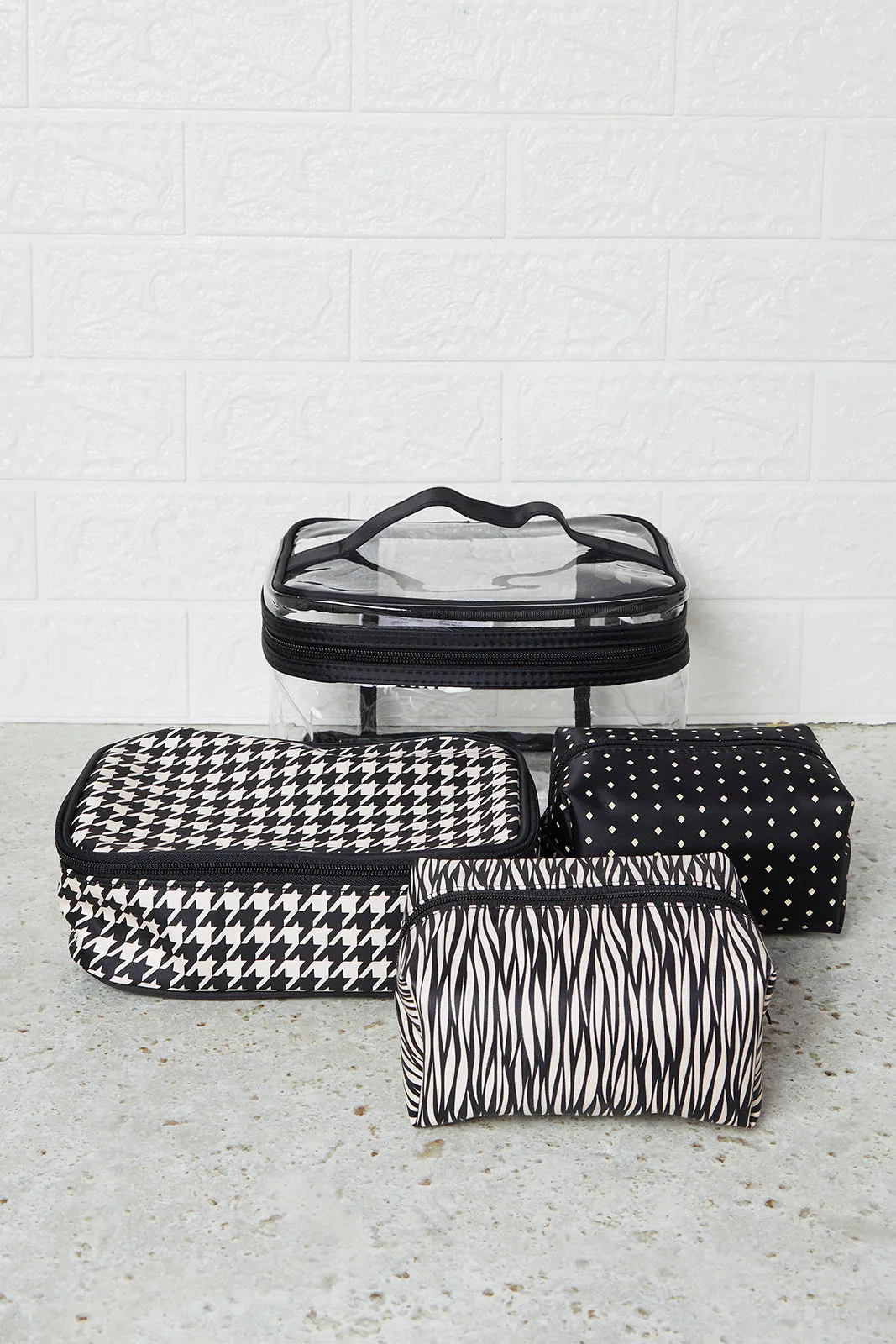 Women Black And Brown Printed Cosmetic Pouch Set (4 Piece) sold by Redtag