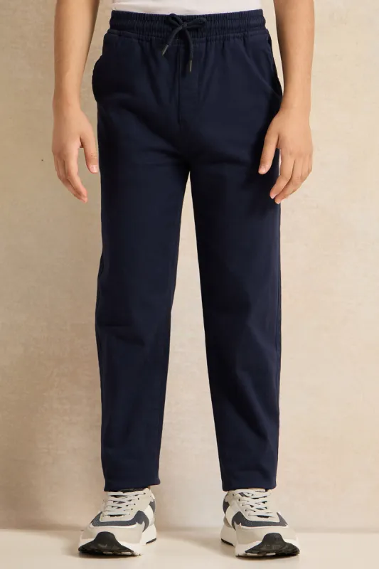 Senior Boys Navy Trousers sold by Redtag