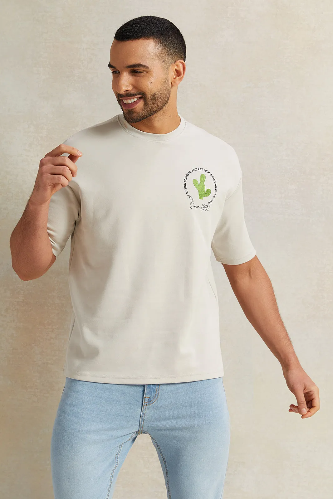 Men Grey Printed Interlock Oversized T-Shirt sold by Redtag