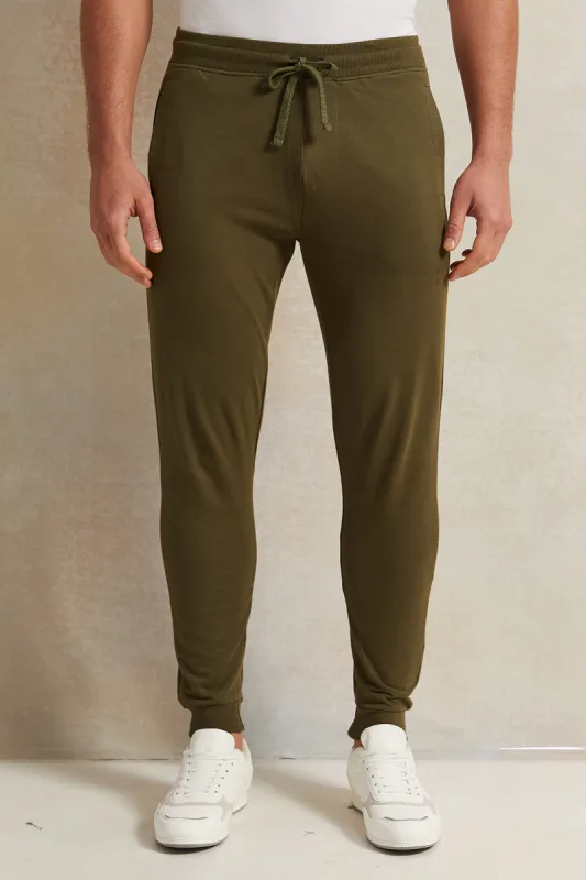 Men Green Solid Active Pants sold by Redtag