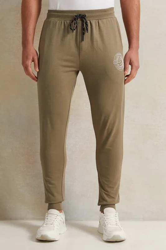Men Olive Printed Active Pants sold by Redtag