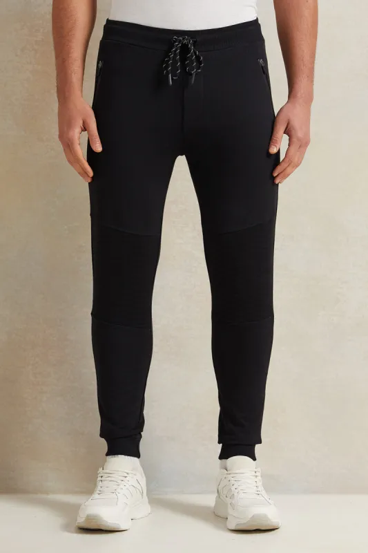 Men Black Solid Active Pants sold by Redtag