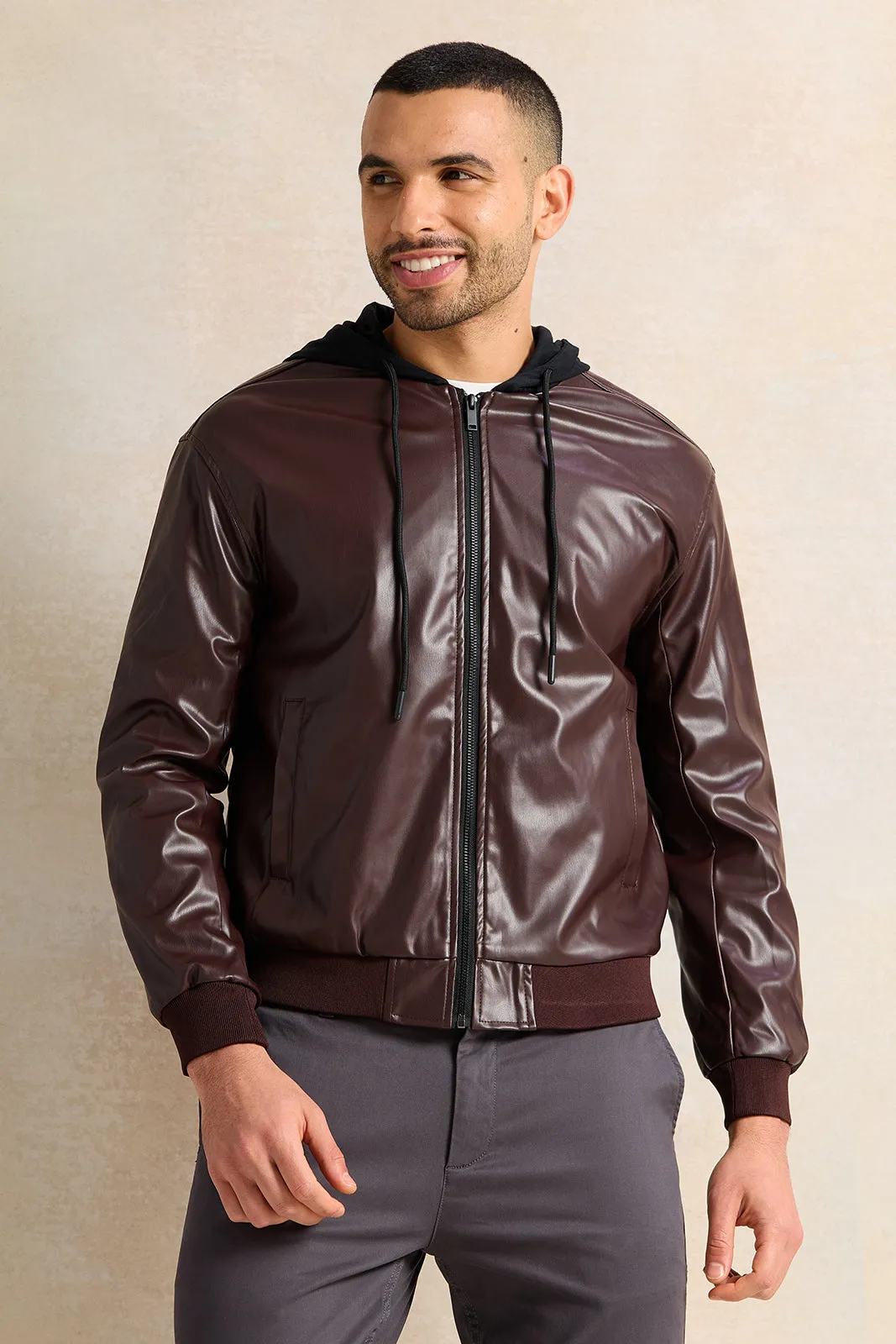 Men Burgundy Faux Leather Jacket With Hood sold by Redtag