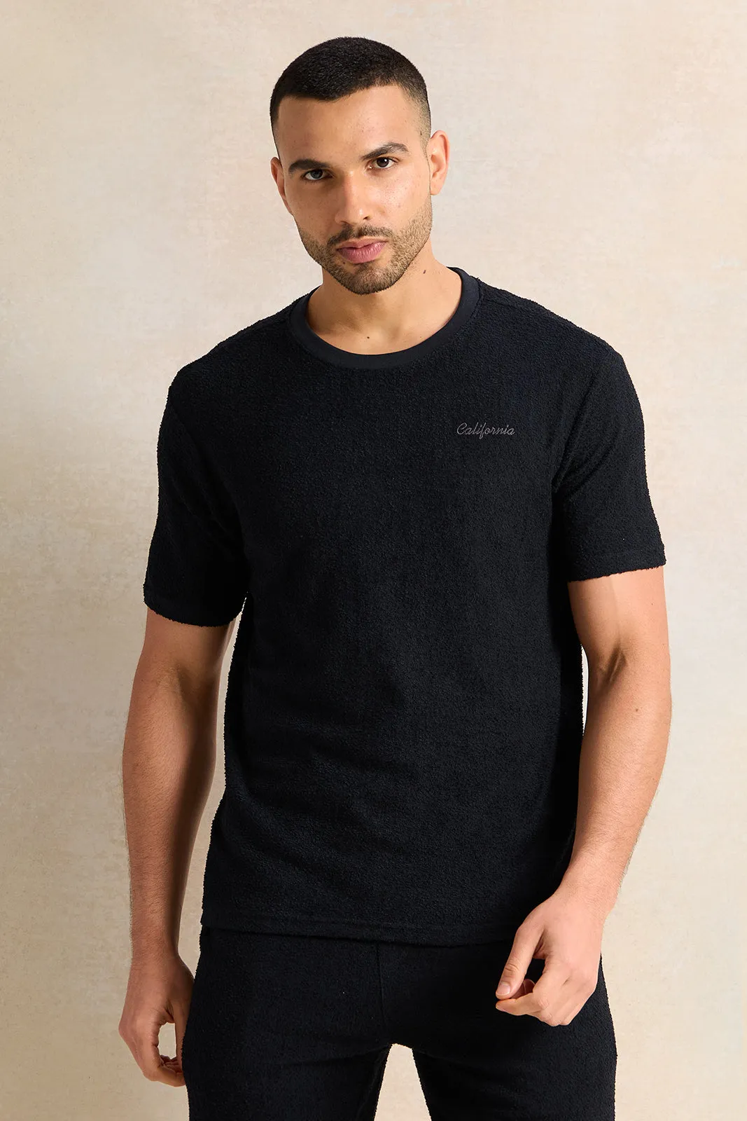Men Black Textured T-Shirt sold by Redtag