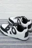 Senior Boys White And Black Sneakers sold by Redtag