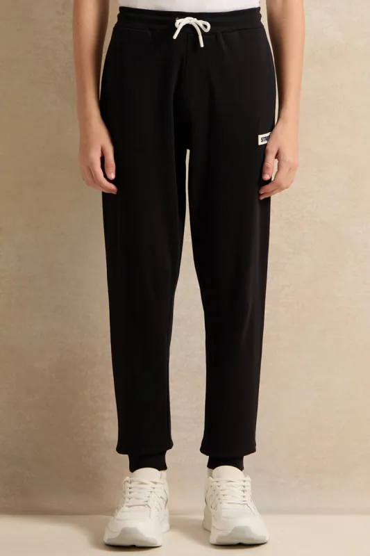 Senior Boys Black Printed Active Pants sold by Redtag
