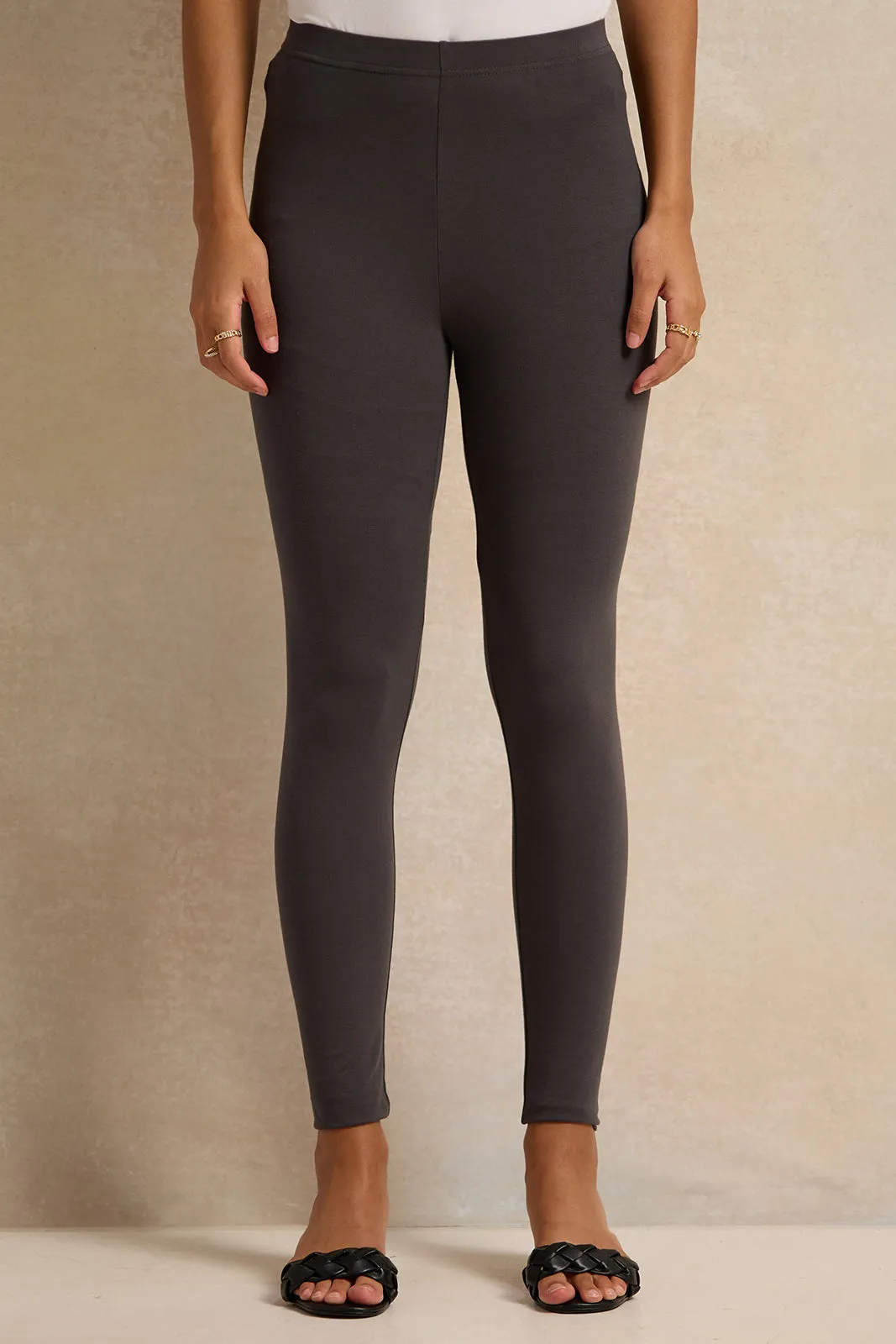Women Charcoal Solid Legging sold by Redtag