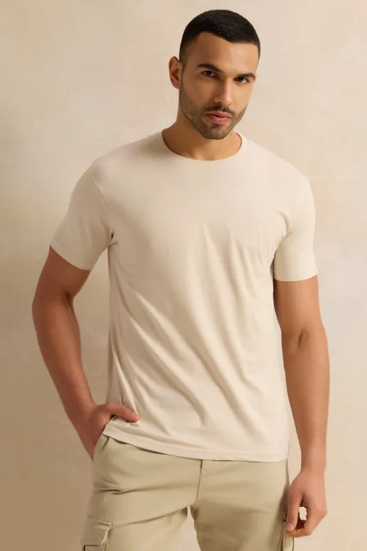 Men Beige Solid T-Shirt sold by Redtag
