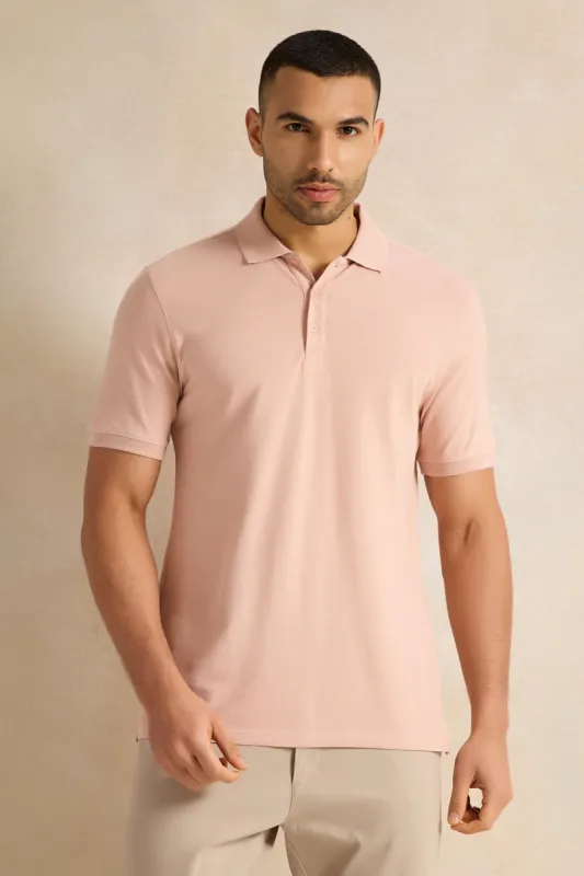 Men Pink Solid Polo Shirt sold by Redtag