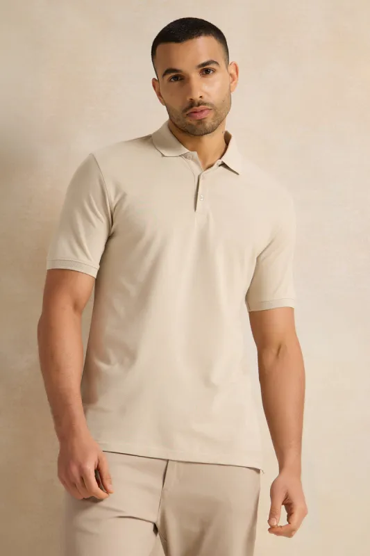 Men Beige Solid Polo Shirt sold by Redtag