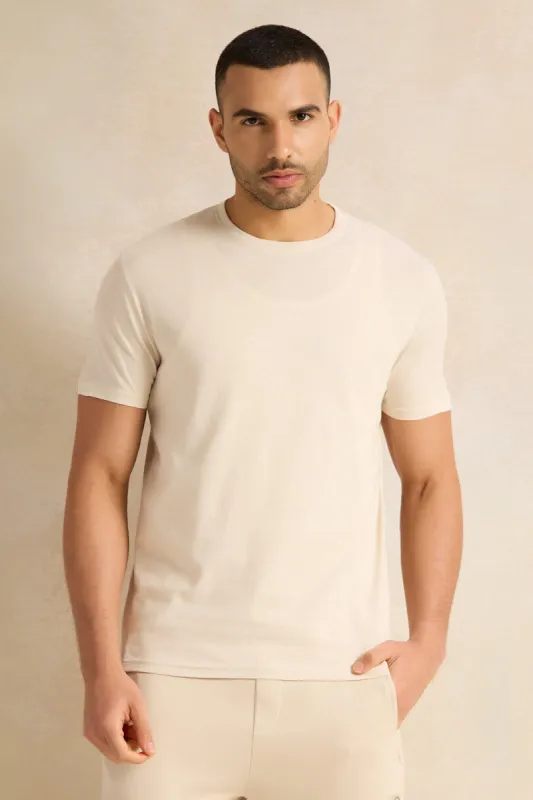 Men Beige Solid T-Shirt sold by Redtag