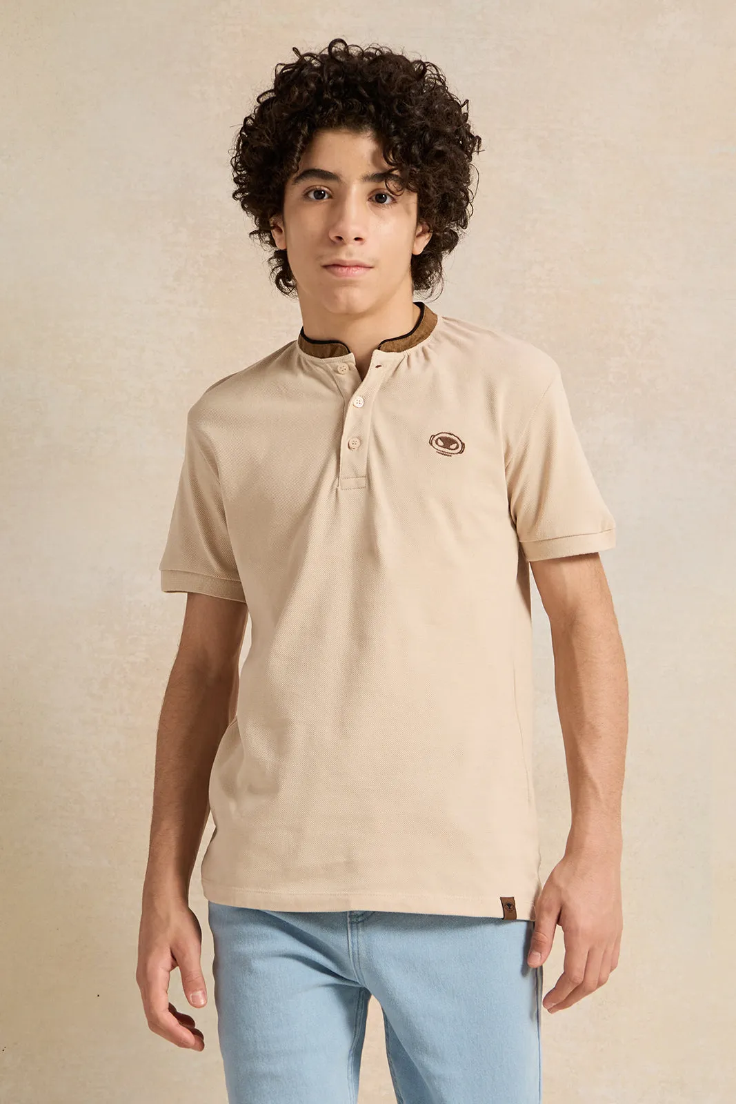 Senior Boys Beige Embroidered Polo Shirt sold by Redtag