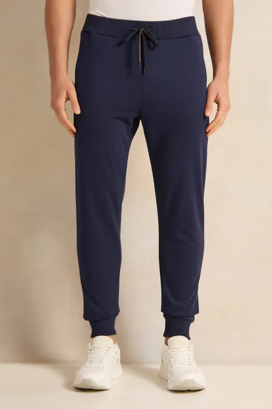 Men Navy Solid Active Pants sold by Redtag