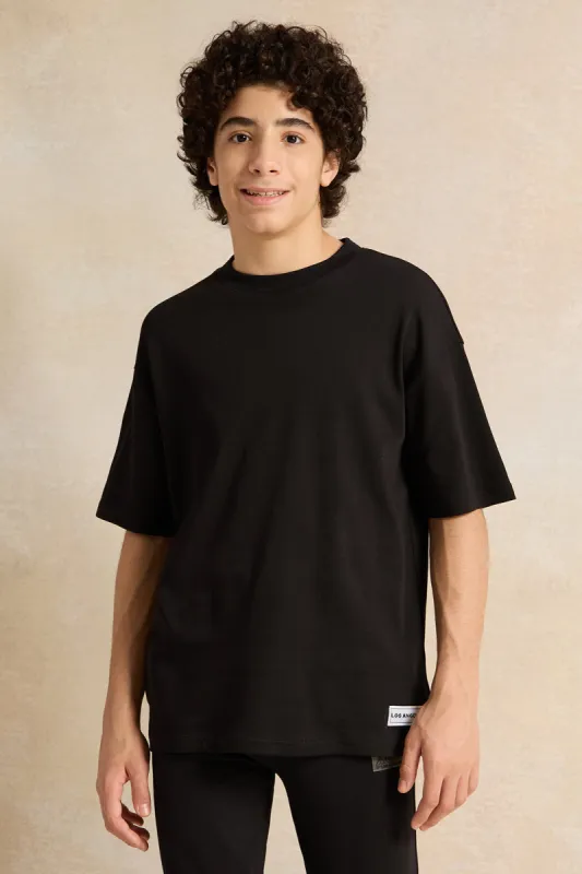 Senior Boys Black Short Sleeve Oversize T-Shirt sold by Redtag