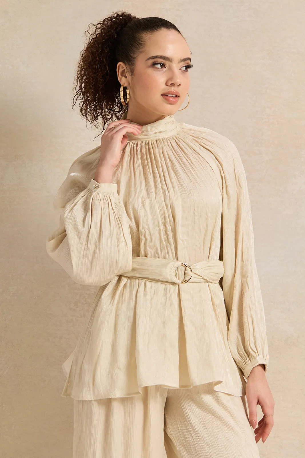 Women Cream Shimmer Crinkle Belted Top sold by Redtag