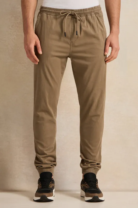 Men Brown Solid Active Track Pants sold by Redtag