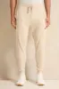 Men Beige Pleated Interlock Lounge Active Pants sold by Redtag