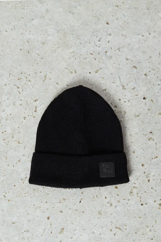 Women Black Embellished Knitted Cap sold by Redtag