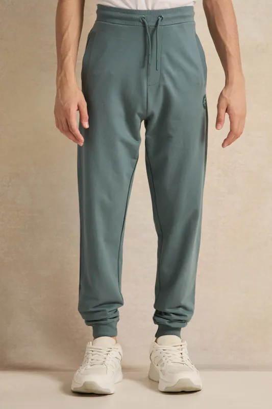 Senior Boys Teal Solid Active Pants sold by Redtag