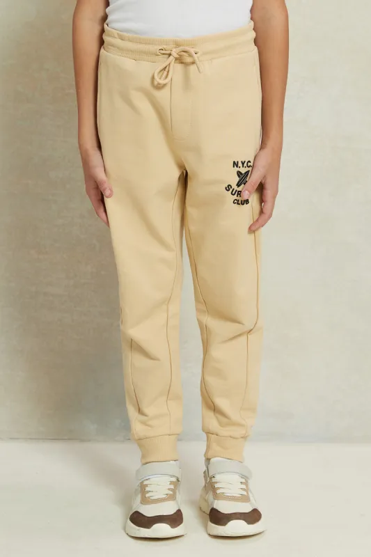 Boys Beige Printed Jogger Pants sold by Redtag